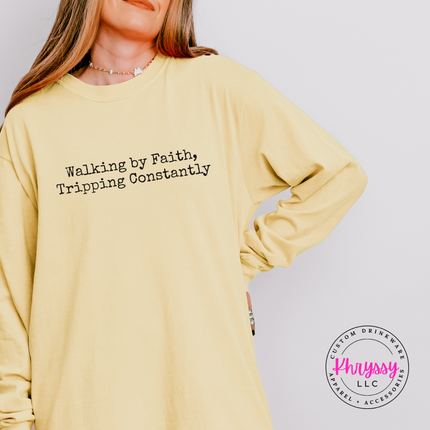 Butter long sleeve tee with the relatable walking by faith Christian graphic