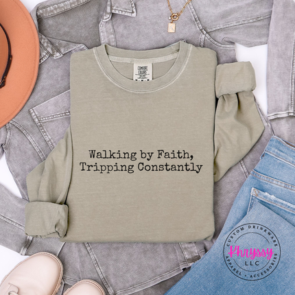 Khaki long sleeve tee with the tripping constantly faith humor typewriter text