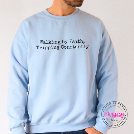 Man wearing a cozy Gildan crewneck with funny faith typewriter-style graphic.