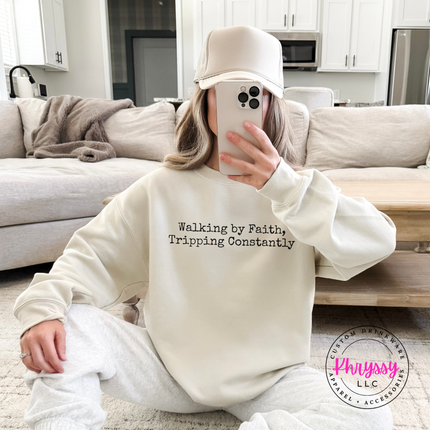 Sand crewneck sweatshirt with the funny walking by faith Christian saying