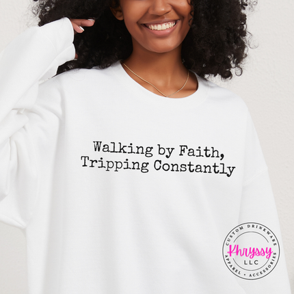 Woman laughing in a faith-and-humor crewneck sweatshirt at home.