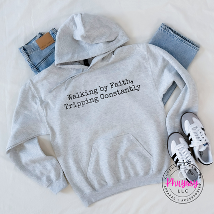 Ash hoodie with the Walking By Faith, Tripping Constantly quote