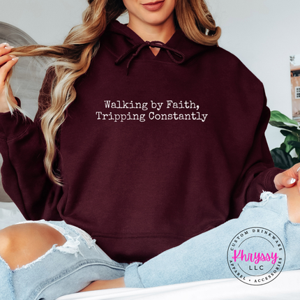 Maroon hoodie with the tripping constantly faith humor typewriter text