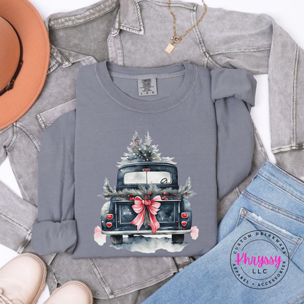 Close up of the watercolor Christmas truck art on a Granite long sleeve tee.