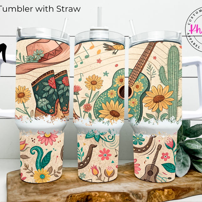 40oz tumbler with straw featuring country music-themed design on a wooden surface.