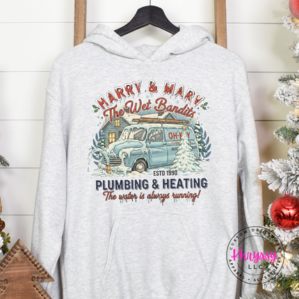 Ash pullover hoodie with a retro plumbing and heating badge and snowy van.