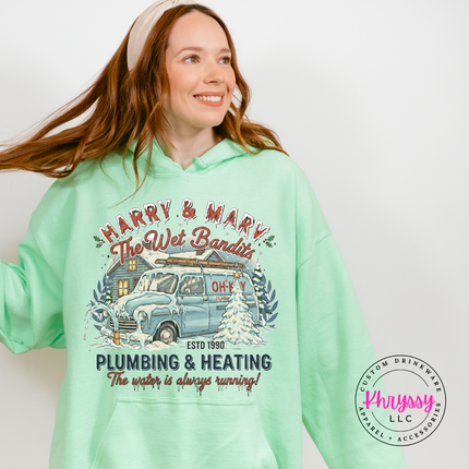 Mint Green hoodie featuring a snowy cabin and van in a retro holiday badge.