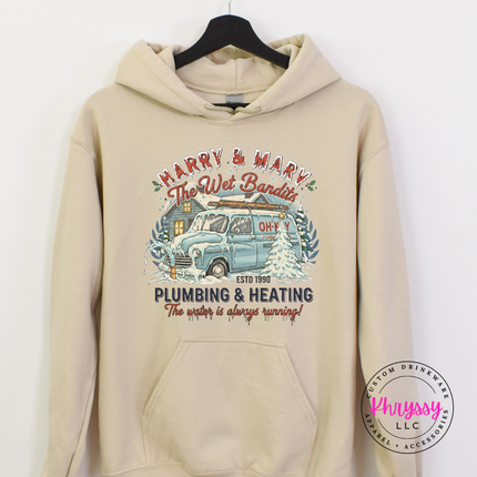Sand hoodie with a kangaroo pocket and a retro snowy van holiday badge.