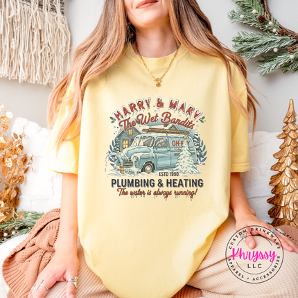 Close up of a snow covered vintage van illustration on a Butter Comfort Colors tee.