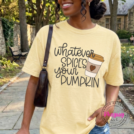 Woman wearing a Banana yellow graphic tee with a Whatever Spices Your Pumpkin design.