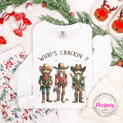 Flat lay of the cowboy nutcracker Christmas long sleeve tee in White.