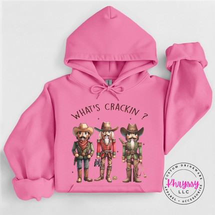 Model wearing the cowboy nutcracker hoodie in Azalea.