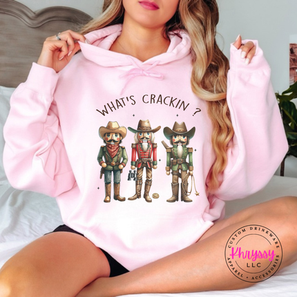 Flat lay of the cowboy nutcracker Christmas hoodie in Light Pink.