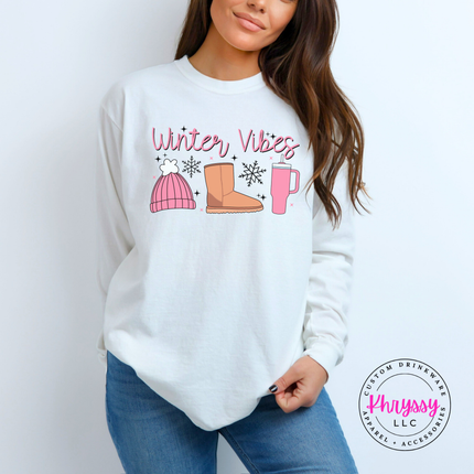 Close up of the Winter Vibes script and snowflakes on a White long sleeve tee.