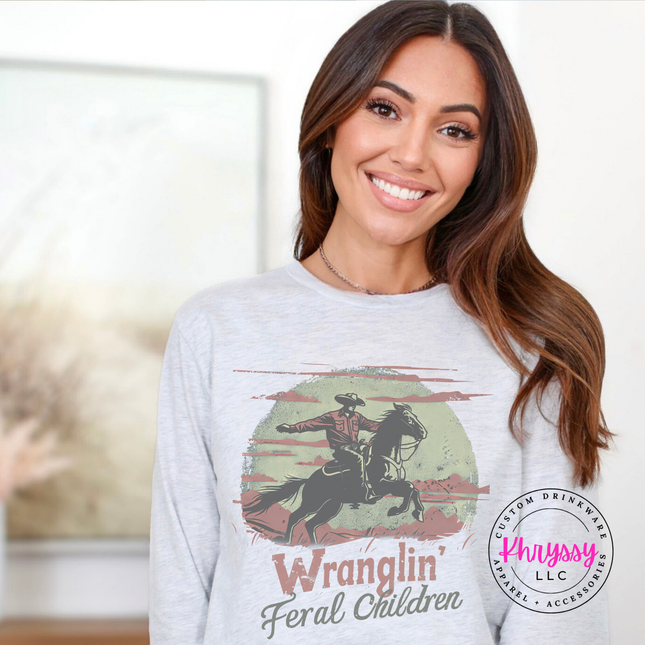 Ash gray crewneck with a vintage Wranglin Feral Children design.