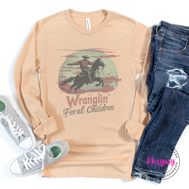 Sand dune tee showing a muted vintage cowboy mom graphic.