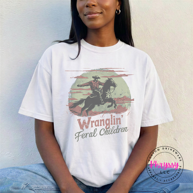 White cotton tee with a western feral children humor print.