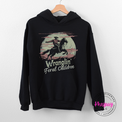 black hoodie featuring a cowboy on a bucking horse.