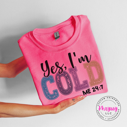 Safety Pink crewneck sweatshirt showing sparkly Cold letters with Me 24 7.