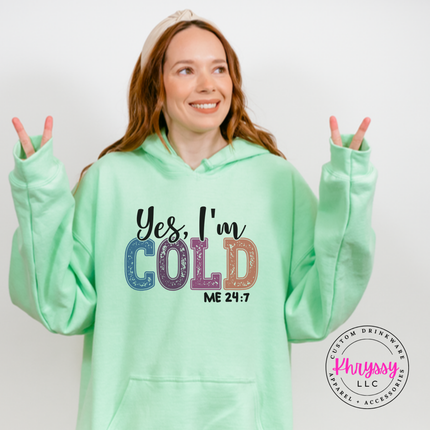 Flat lay of the Yes I'm Cold Christmas hoodie in Mint Green.