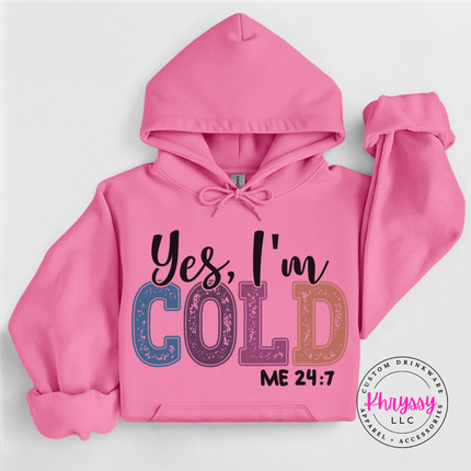 Model wearing the Yes I'm Cold hoodie in Azalea.