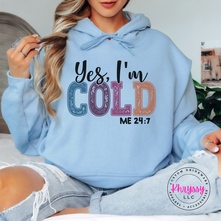 Close up of the Yes I'm Cold art on a Light Blue hoodie.