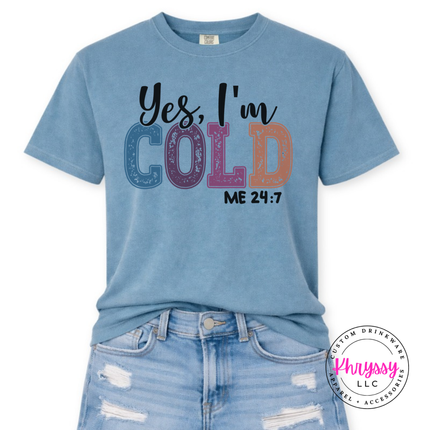Flat lay of the Yes I'm Cold Christmas tee in Ice Blue.