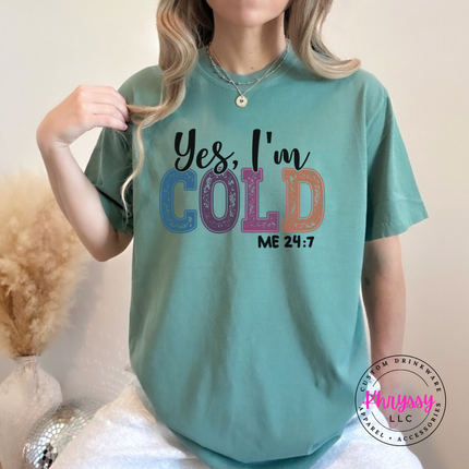 Model wearing the Yes I'm Cold tee in Light Green.
