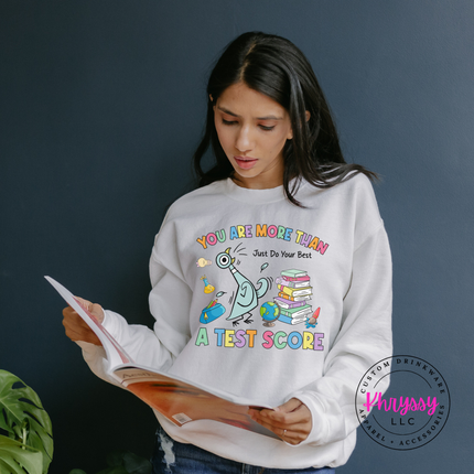 Scores Don't Define Them — Gildan Motivational Teacher Crewneck