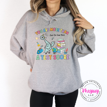 Scores Don't Define Them — Gildan Motivational Teacher Hoodie