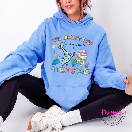 Scores Don't Define Them — Gildan Motivational Teacher Hoodie
