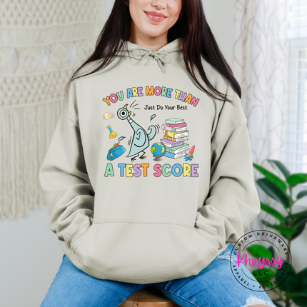 Scores Don't Define Them — Gildan Motivational Teacher Hoodie