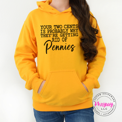 Flat lay of a Gold pullover hoodie with a dry humor pennies graphic.
